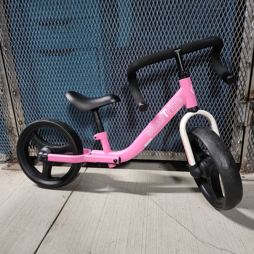 Pink and Black Balance Bike with Large Wheels
